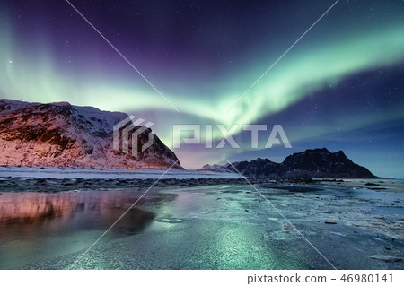 Northen light above mountains and ocean, Norway Northen light above mountains and ocean, Norway 46980141