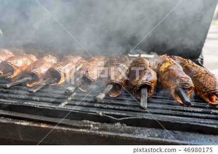 Grilled fish 46980175
