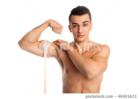 Man doing measurements of biceps 46981613