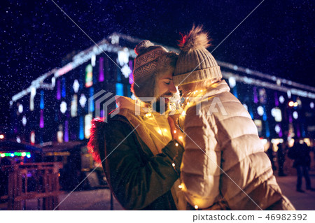 Adult couple hanging out in the city during Christmas time 46982392