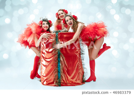 young beautiful dancers posing on studio background young beautiful dancers posing on studio background 46983379