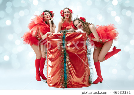 young beautiful dancers posing on studio background 46983381