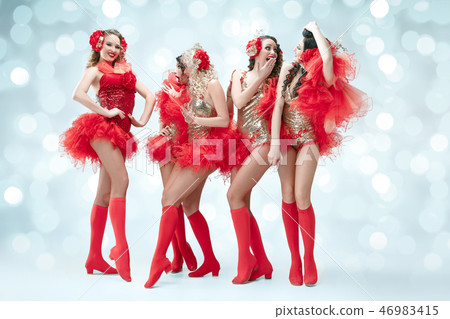 young beautiful dancers posing on studio background 46983415