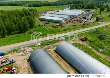 Farmer machine yard in Verhovina. Russia Farmer machine yard in Verhovina. Russia 46983910