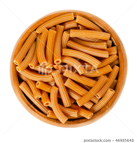 Chickpea pasta, brown Sedanini Rigati, in bowl Chickpea pasta, brown Sedanini Rigati, in bowl 46985648