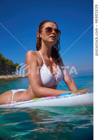 Beautiful Young Girl Floating On A Mattress In The Sea Stock Pho Beautiful Young Girl Floating On A Mattress In The Sea Stock Pho 46985839