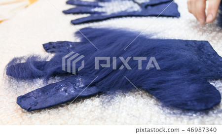 second layer of fibers on glove close up 46987340