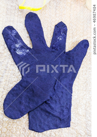 wet felted glove before matting 46987484
