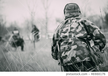 German soldier in uniform Wehrmacht in attack from the back 46988176