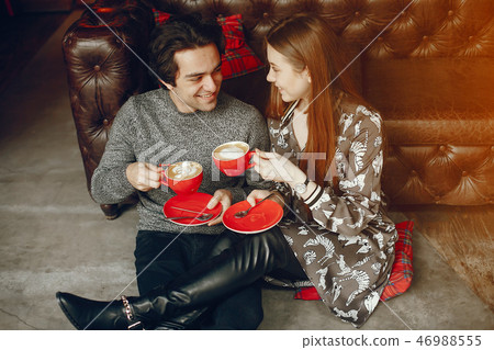 Cute couple spend time in a cafe 46988555