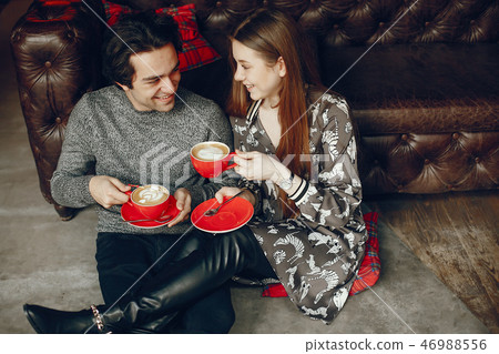 Cute couple spend time in a cafe Cute couple spend time in a cafe 46988556