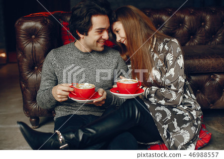 Cute couple spend time in a cafe Cute couple spend time in a cafe 46988557