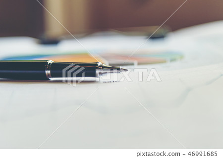Sales report analysis with pen. Business Concept,  46991685
