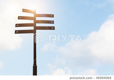 signpost guide direction sign on a pole 46994068