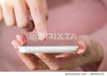 women shopping online on smartphone. business women shopping online on smartphone. business 46994291