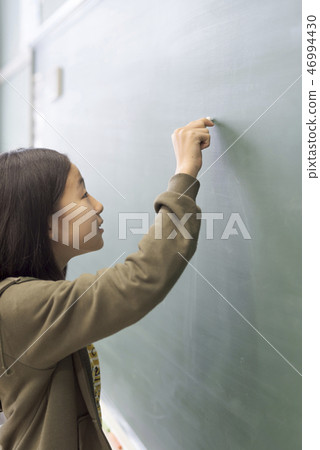Elementary school image Children who write on the blackboard Elementary school image Children who write on the blackboard 46994430