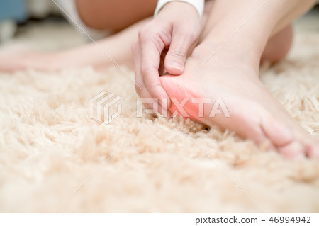 foot ankle injury pain woman touch foot painful foot ankle injury pain woman touch foot painful 46994942