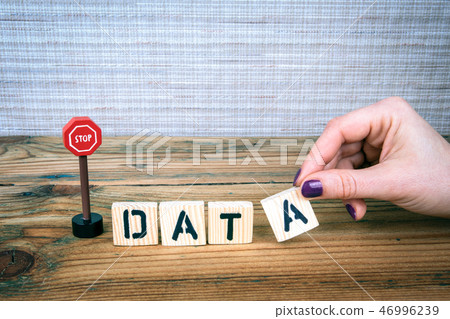 data concept. Wooden letters with road sign data concept. Wooden letters with road sign 46996239