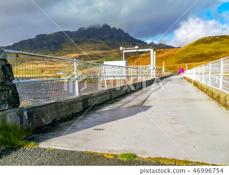 The Storr Lochs hydroelectric power station nestled under the mountains of the Trotternish Peninsula 46996754