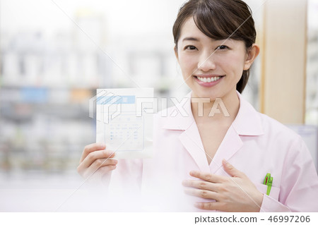 Dispensing pharmacist medical image Pharmacist woman with medicine bag 46997206