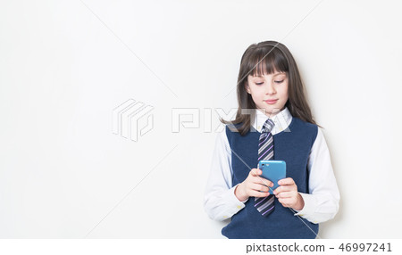 Girl looking at smartphone 46997241