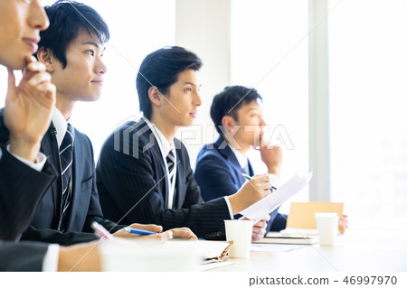 4 male employees taking a seminar Business image 4 male employees taking a seminar Business image 46997970