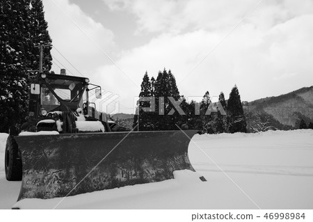 Winter scene with snowplow 46998984