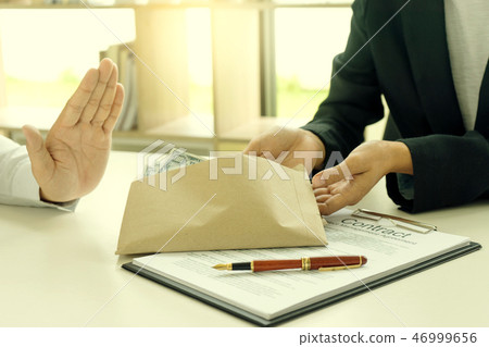 Business man give bribe to the officer but  say no 46999656