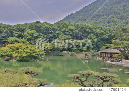 Japanese garden with pond and river, 47001424