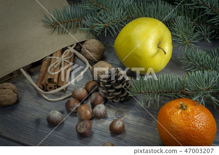 Nuts apple and cinnamon holiday groceries concept 47003207