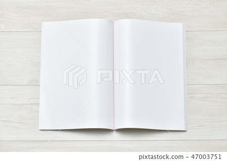 Image of blank paper, white page, blank book, booklet. A stack of paper for printing. An image with nothing written. Image of blank paper, white page, blank book, booklet. A stack of paper for printing. An image with nothing written. 47003751