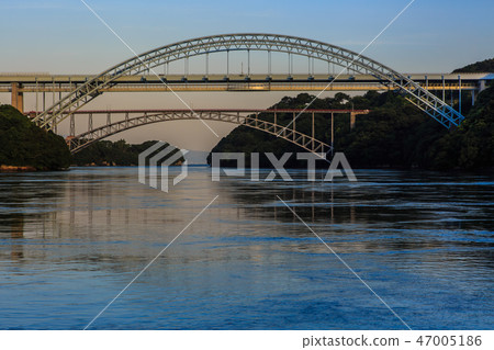Sunset on the Saikai Bridge and the Shinseikai Bridge [Sasebo City, Saikai City, Nagasaki Prefecture] 47005186