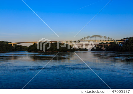 Sunset on the Saikai Bridge and the Shinseikai Bridge [Sasebo City, Saikai City, Nagasaki Prefecture] 47005187