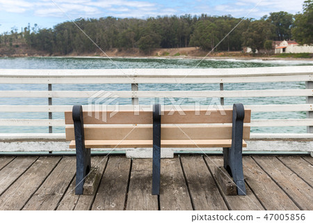 A bench in the pier of San Simeon, California, USA 47005856