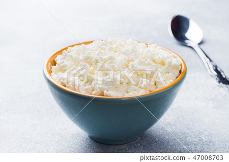 Homemade Cottage cheese in a ceramic bowl Homemade Cottage cheese in a ceramic bowl 47008703