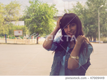 Cute girl in denim jacket. Cute girl in denim jacket. 47009449