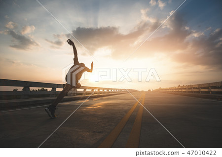Athlete runner feet running on road Athlete runner feet running on road 47010422