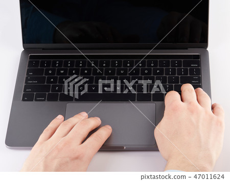 Typing on laptop close up Typing on laptop close up 47011624