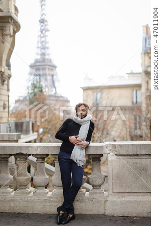 Young Black Man And His Motorcycle In Paris 47011904