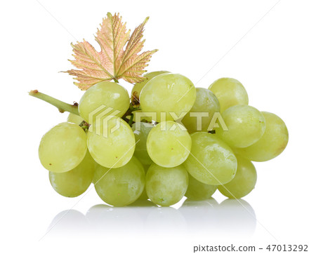 Green grapes with leaf on white background 47013292