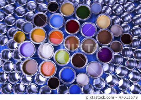 Collection of colored paints cans 47013579