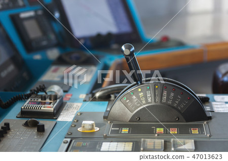 Control panel of a cargo merchant ship with stick in slow ahead mode. Control panel of a cargo merchant ship with stick in slow ahead mode. 47013623