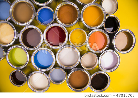 Colours paint can, yellow background Colours paint can, yellow background 47013705
