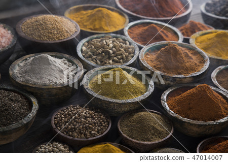 Aromatic spices on wooden background Aromatic spices on wooden background 47014007
