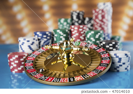 Poker Chips, Roulette wheel in motion, casino  47014010