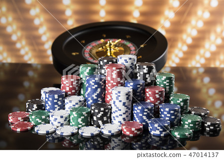 Poker Chips, Roulette wheel in motion, casino  47014137