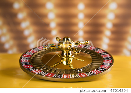 Roulette wheel in motion in a casino background 47014294