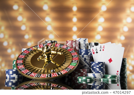 Poker Chips, Roulette wheel in motion, casino  47014297
