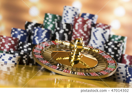 Poker Chips, Roulette wheel in motion, casino Poker Chips, Roulette wheel in motion, casino 47014302