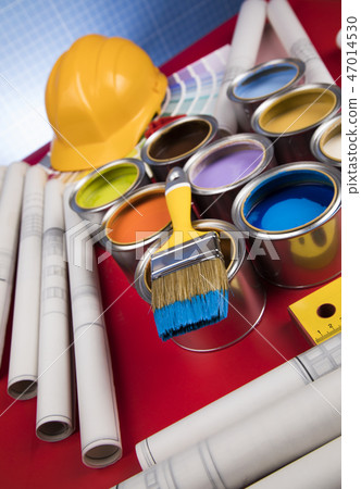 Can with paint and paintbrush, red background 47014530